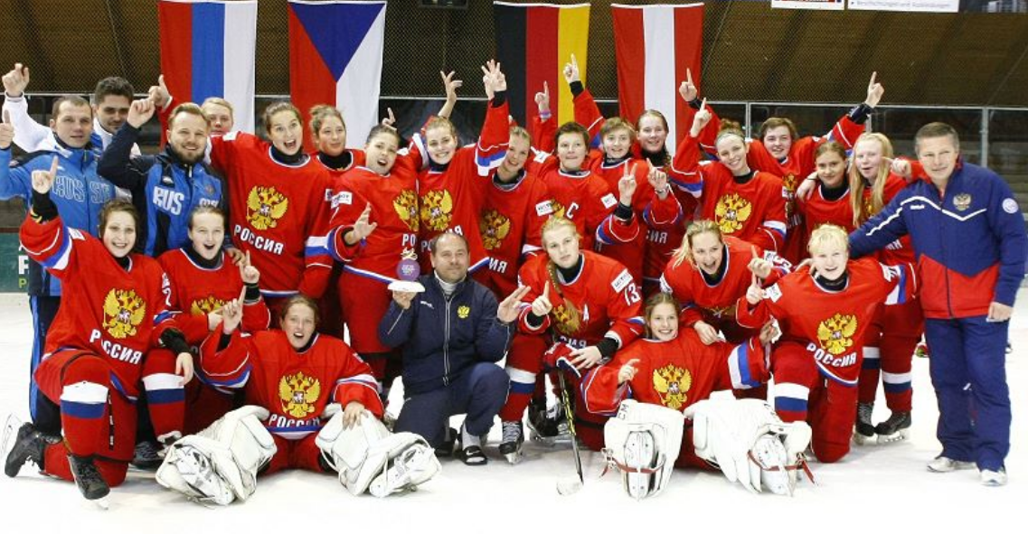 Russia's women's ice hockey team celebrating their bronze medal win at the 2013 IIHF Women's World Championship.